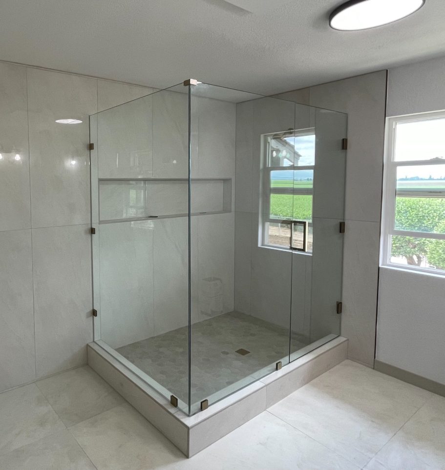 FRAMLESS GLASS SHOWER ENCLOSURES