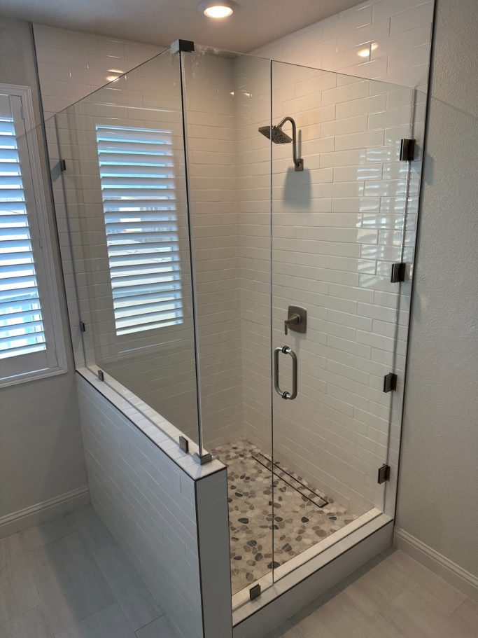 FRAMLESS GLASS SHOWER ENCLOSURES